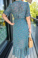 Load image into Gallery viewer, Maisy Frill Hem Wrap Style Maxi Dress In Navy Ditsy Floral Print

